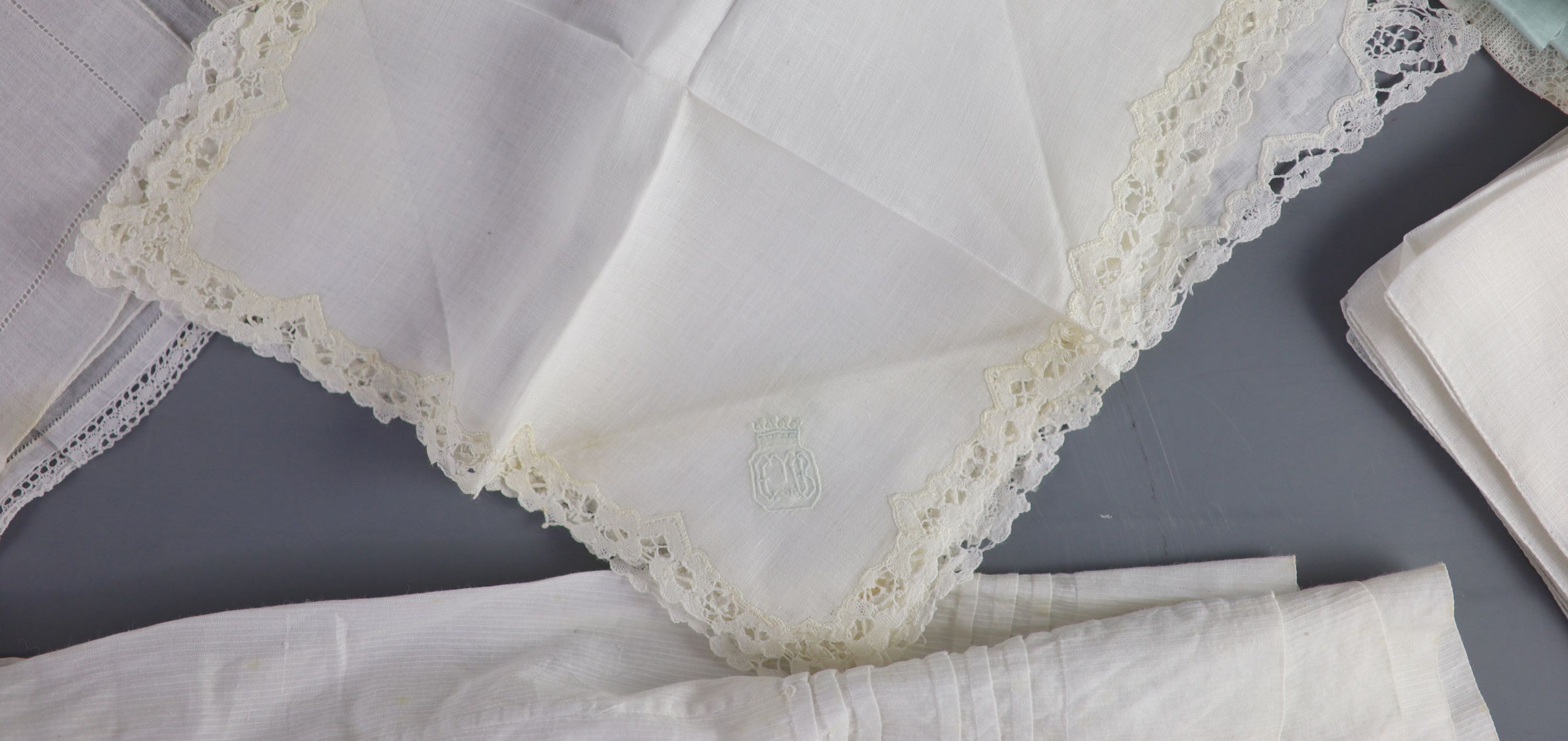 A silk coverlet embroidered 1701 with W initial as a centred cartouche,